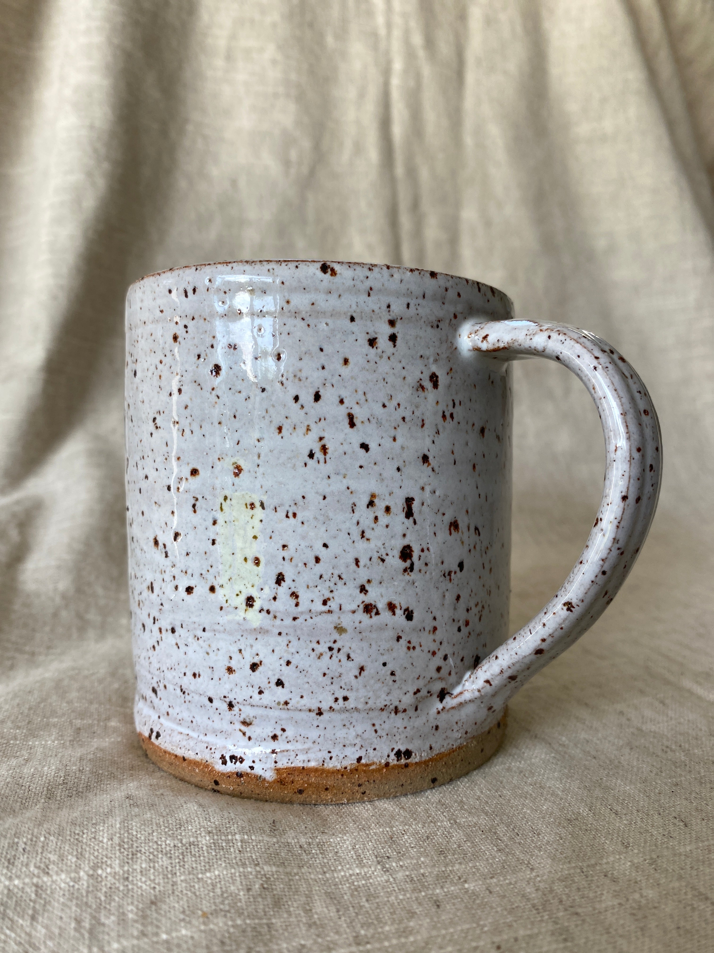 Large handmade speckled white ceramic mug